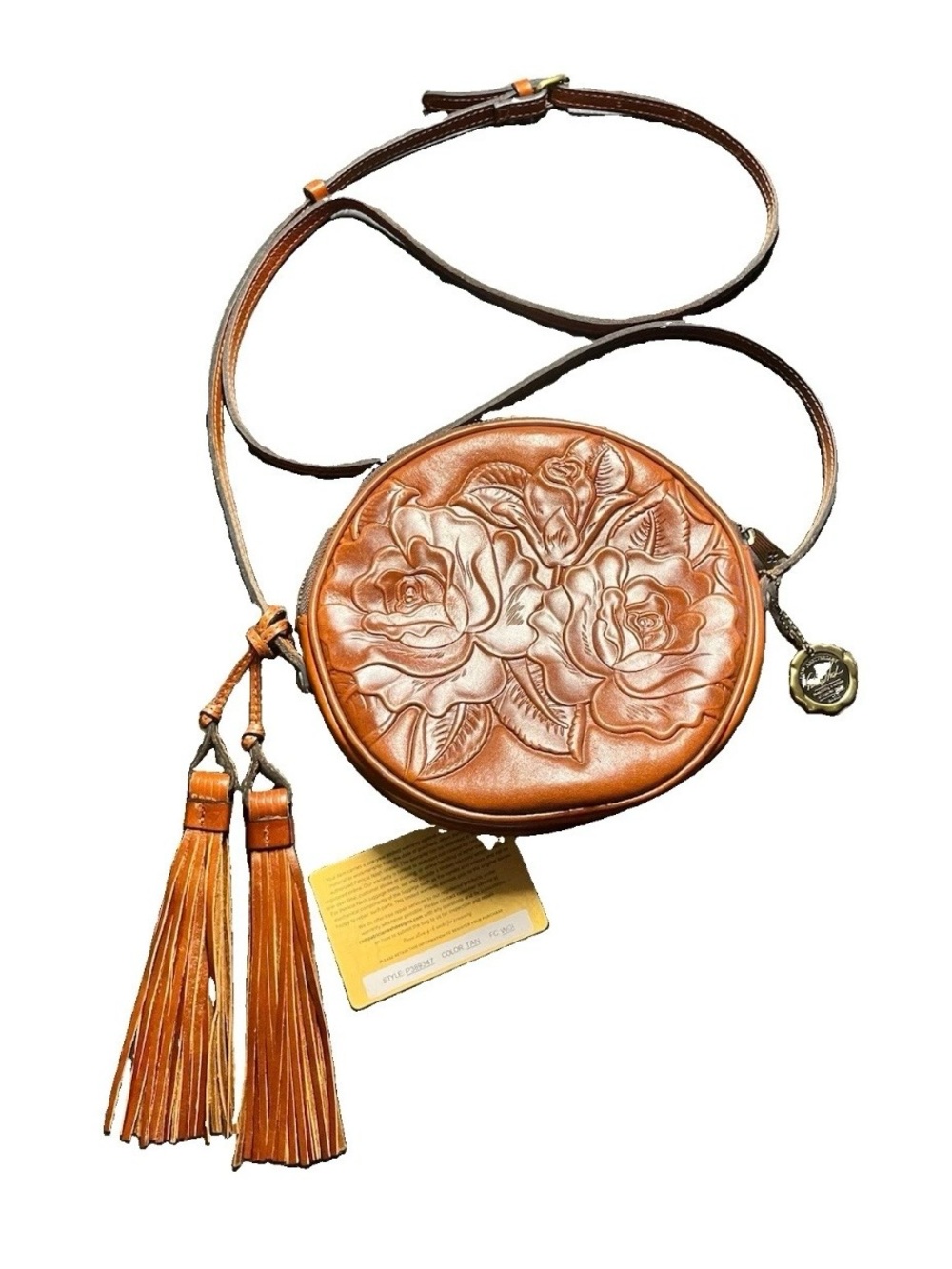NWT Patricia Nash Round Crossbody with imprinted flower Design, velvet lined.